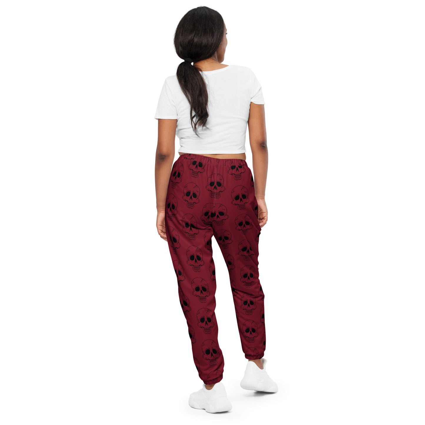 RED LAUGHING SKULL TRACK PANTS
