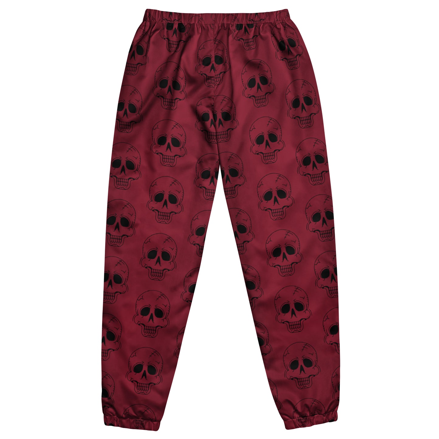 RED LAUGHING SKULL TRACK PANTS