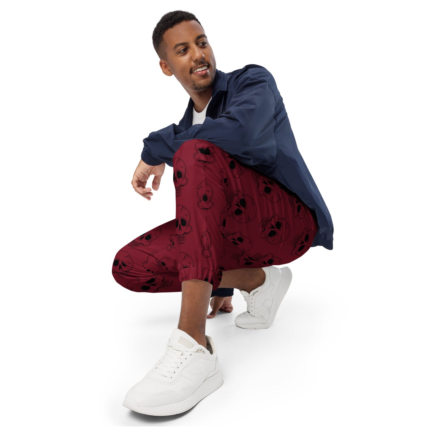 RED LAUGHING SKULL TRACK PANTS