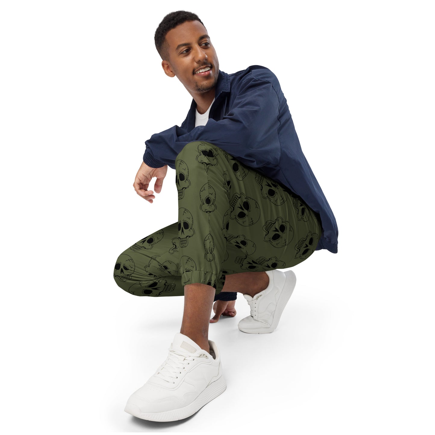 GREEN LAUGHING SKULL TRACK PANTS
