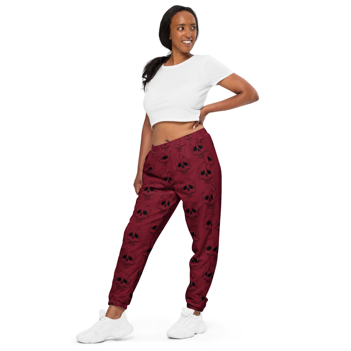 RED LAUGHING SKULL TRACK PANTS