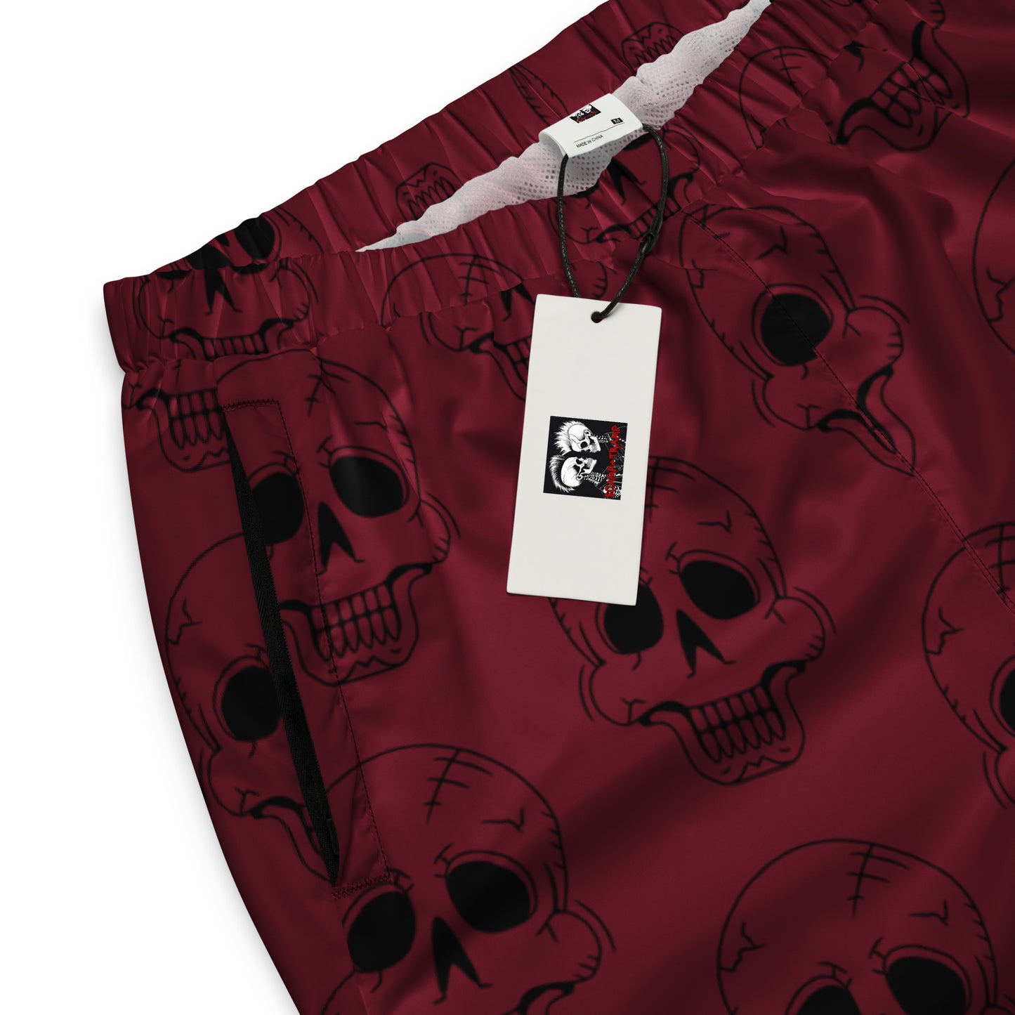 RED LAUGHING SKULL TRACK PANTS