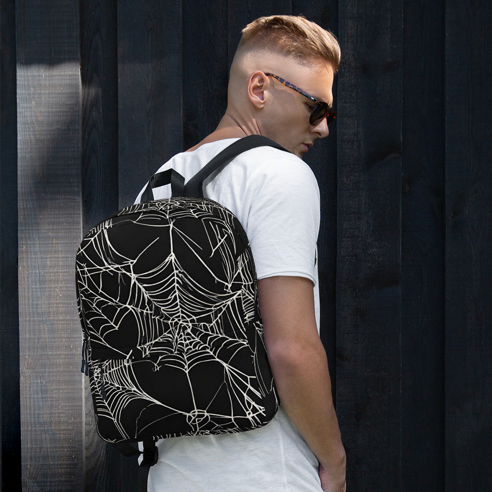 WEB OF LIES BACKPACK