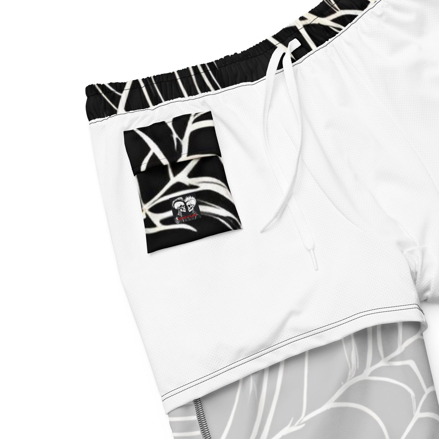 WEB OF LIES SWIM TRUNKS