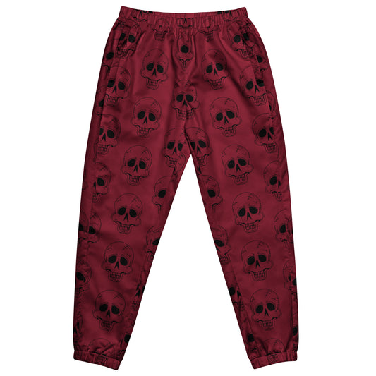 RED LAUGHING SKULL TRACK PANTS