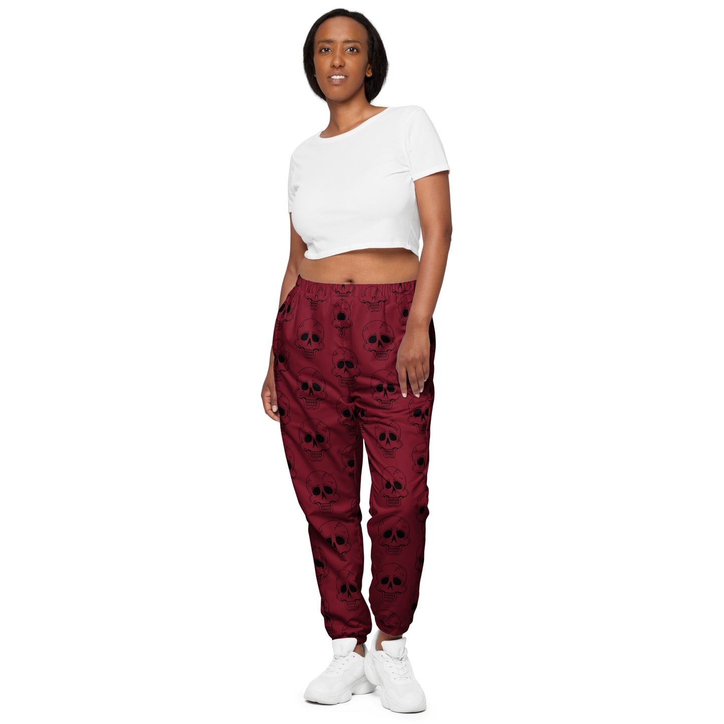 RED LAUGHING SKULL TRACK PANTS